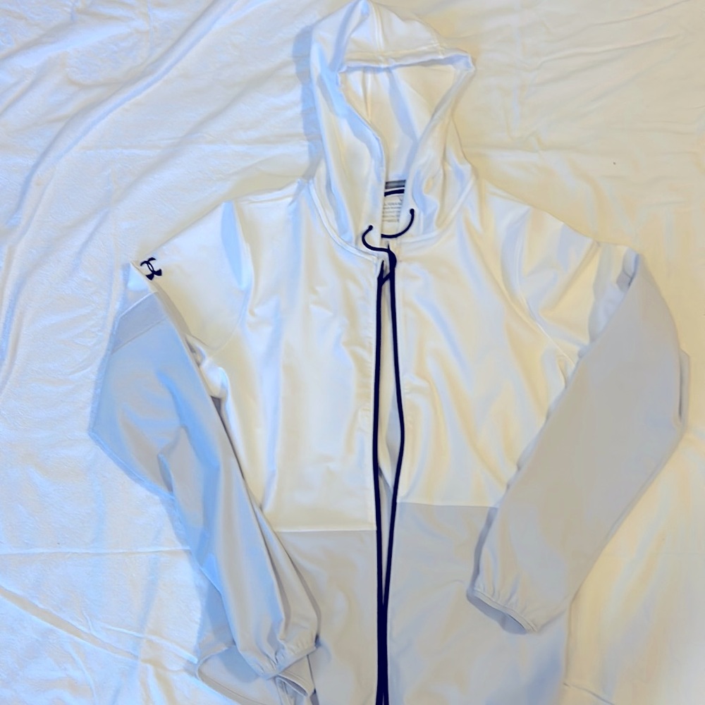 White and grey under armor athletic jacket